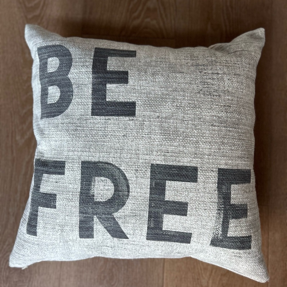 Pottery Barn Gray Throw Pillow with Bold ‘Be Free' Text